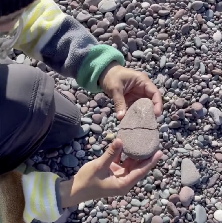 a smoothed lake rock that was recently split in half